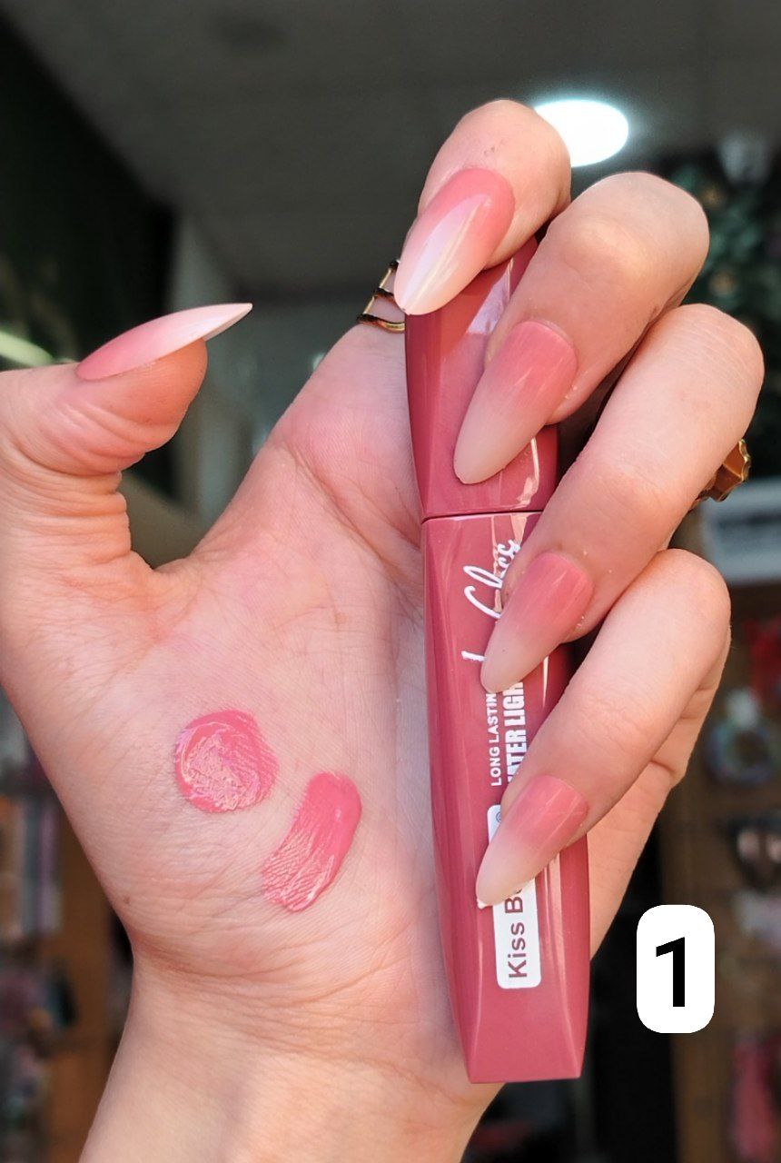 ليب جلوس Kiss Beauty Water Light – ألوان متنوعة – ثبات طويل ولمعة خفيفة