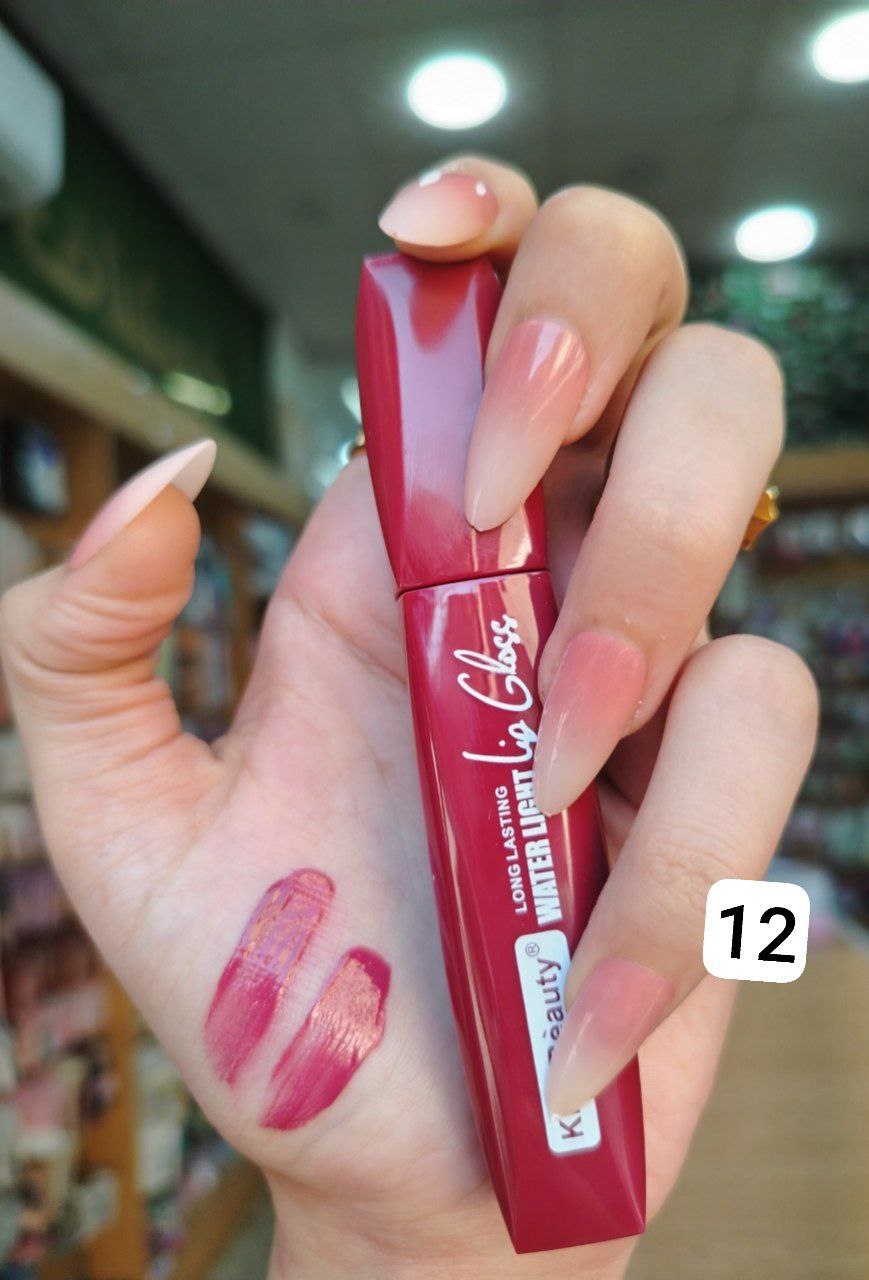 ليب جلوس Kiss Beauty Water Light – ألوان متنوعة – ثبات طويل ولمعة خفيفة