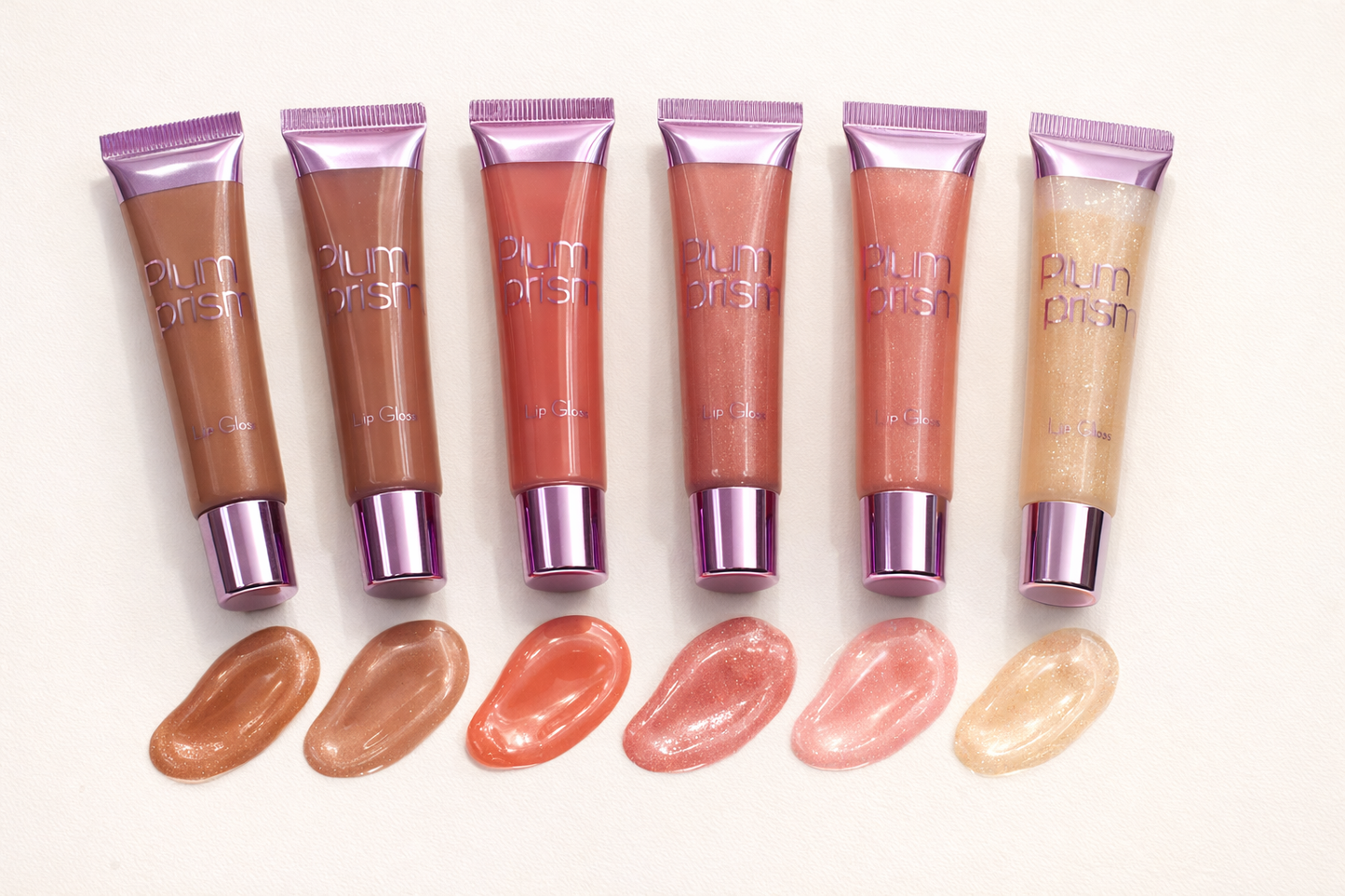 Plum Prism Lip Gloss – ليب جلوس لامع بدرجات متنوعة