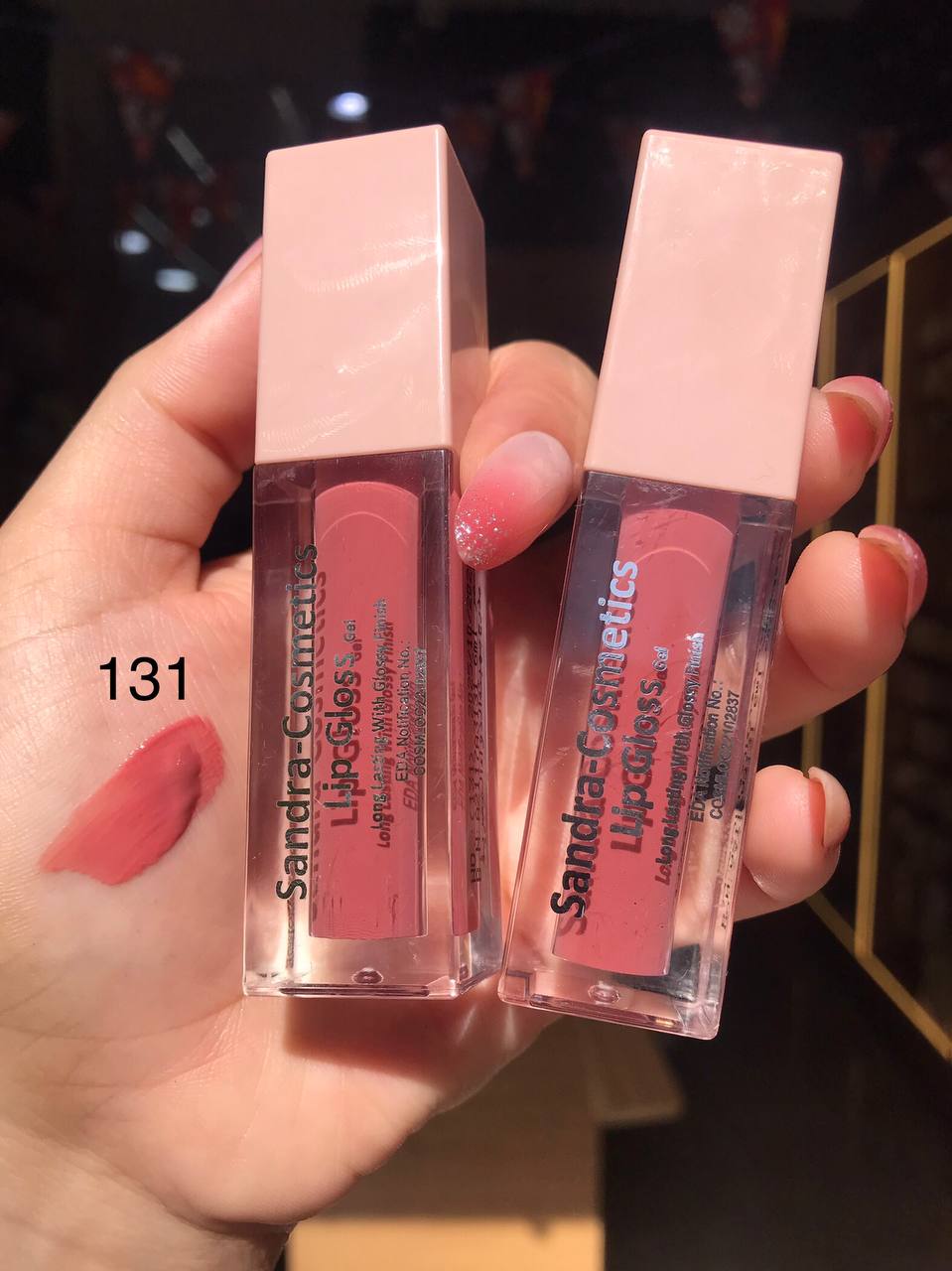 ليب جلوس Sandra Cosmetics بلمعة زجاجية – متوفر بدرجات متعددة