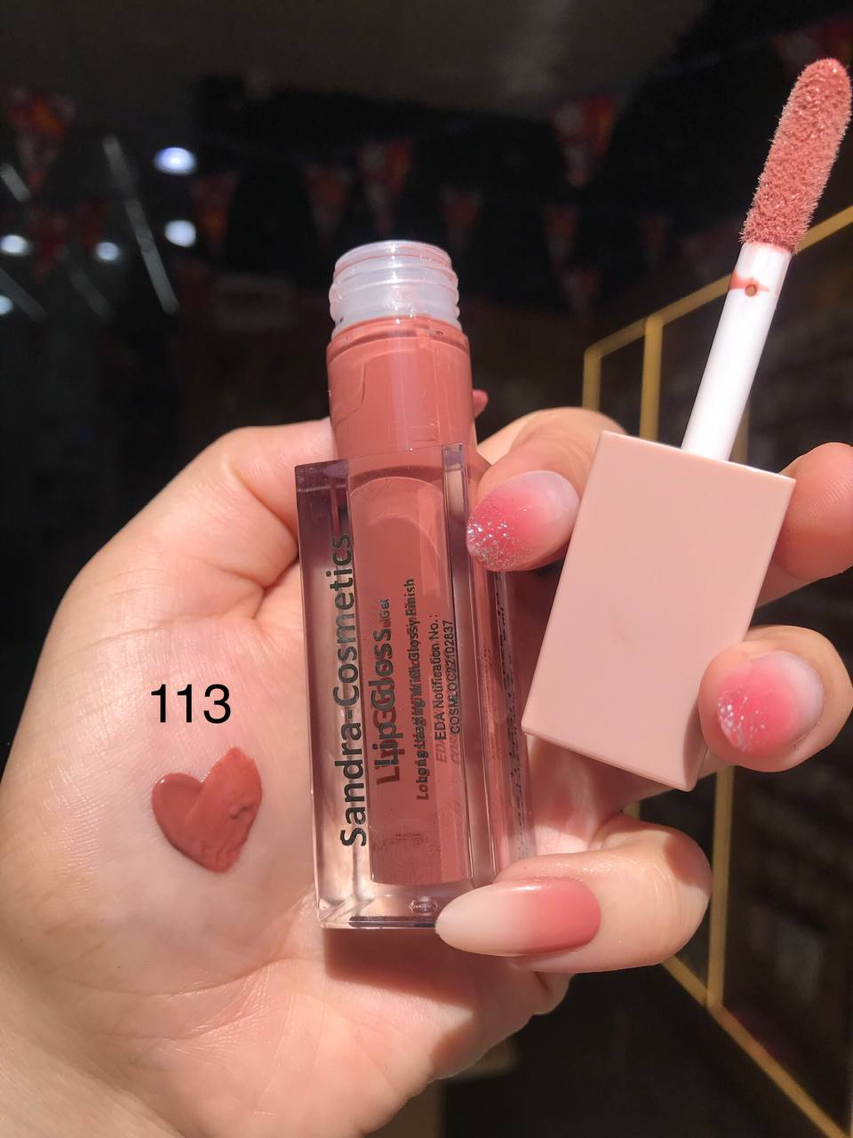 ليب جلوس Sandra Cosmetics بلمعة زجاجية – متوفر بدرجات متعددة